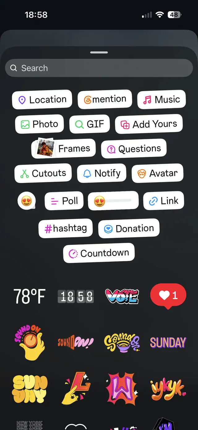 Dark bottom sheet with a search bar and a grid of story sticker options such as Location, Mention, Music, Photo, GIF, Add Yours, Frames, Questions, Cutouts, Notify, Avatar, Poll, Link, Hashtag, Donation, and Countdown, plus colorful sticker thumbnails below.