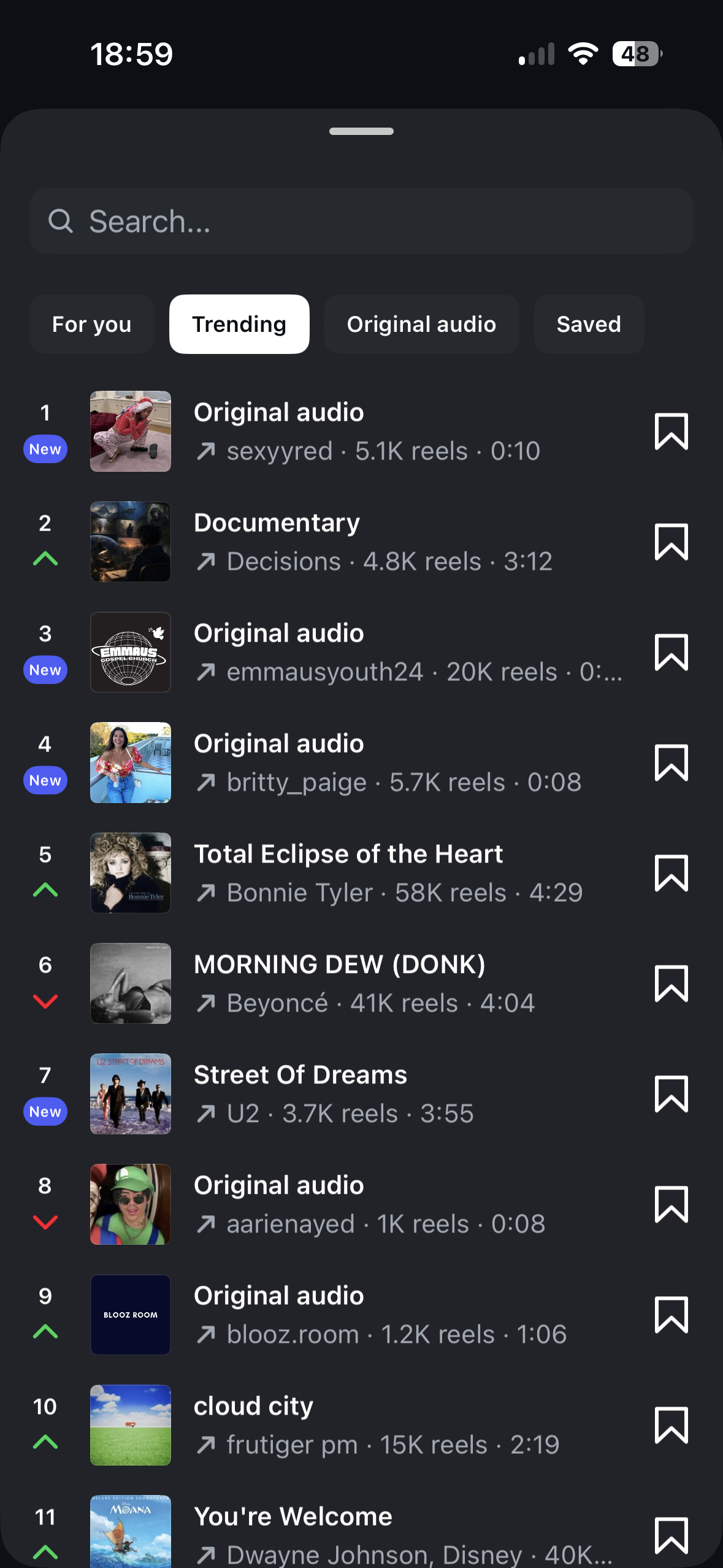 Dark-mode mobile screen showing a searchable list of trending audio tracks, with tabs for For you, Trending, Original audio, and Saved, and bookmark icons to save items.