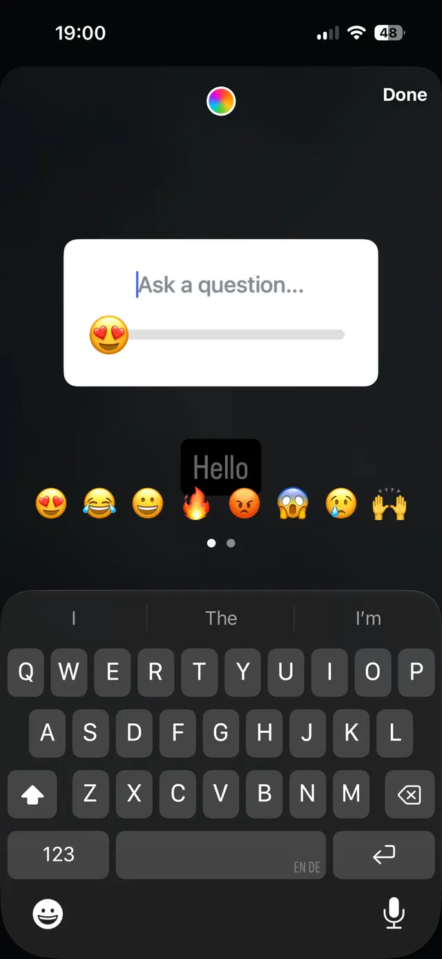 Mobile screen showing a question input card with an emoji slider and emoji keyboard suggestions open, with a Done button at top right.