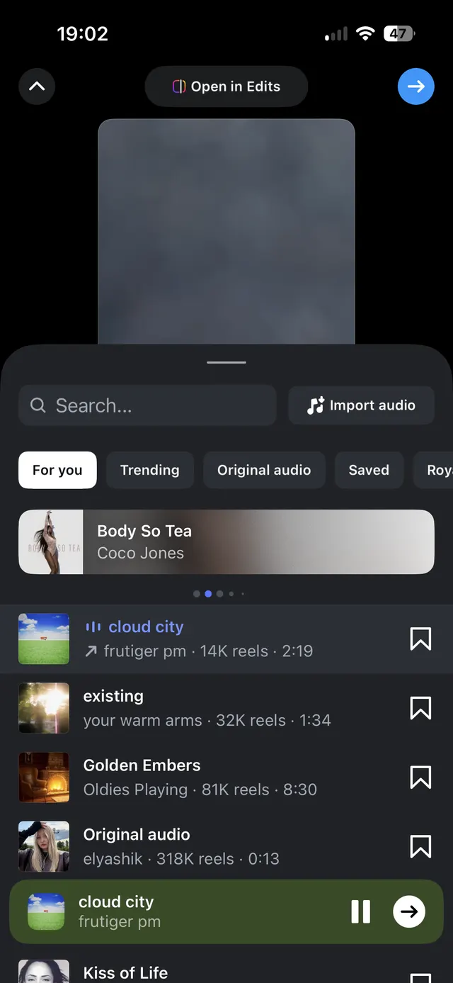 Dark-mode mobile editor screen with a bottom sheet for selecting audio. It includes a search field, an Import audio button, category tabs like For you and Trending, a featured audio card, and a scrollable list of audio tracks with bookmark icons and a currently selected track playback bar at the bottom.