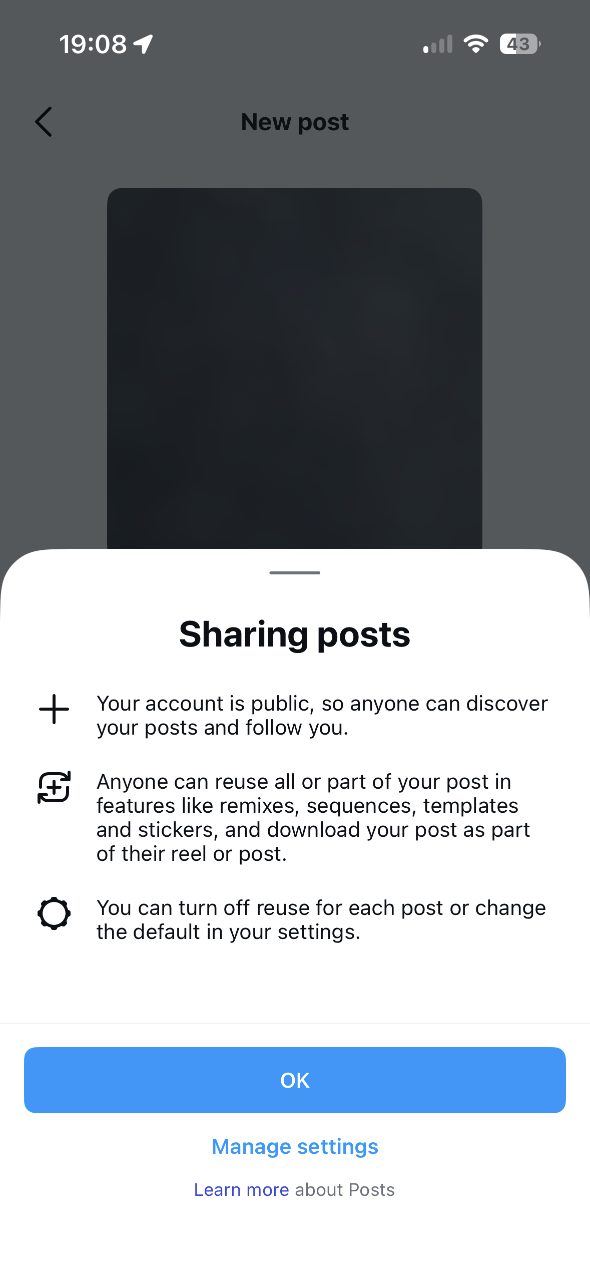 iOS app screen with a bottom sheet titled Sharing posts over a dimmed New post screen. The sheet explains that the account is public, posts can be reused in remixes and templates, and reuse can be turned off in settings. It has an OK button, a Manage settings link, and a Learn more about Posts link.