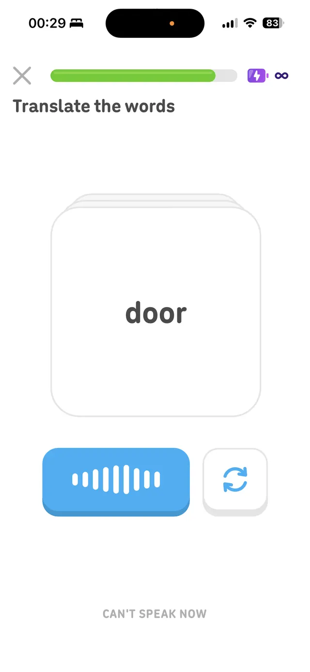 A language learning exercise screen prompting the user to translate the word 'door' with speaking and retry controls.