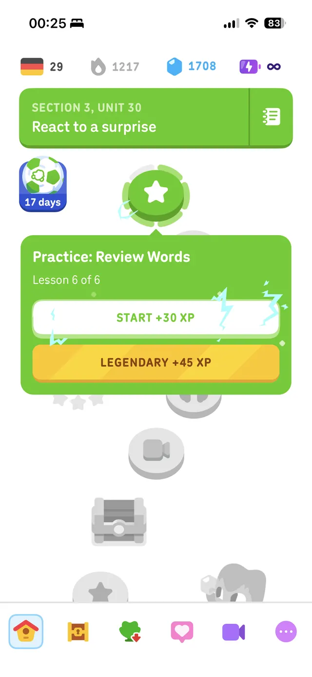 Mobile language-learning app home screen showing a lesson path with a highlighted practice card for “Practice: Review Words,” lesson progress, and start buttons for different XP rewards.