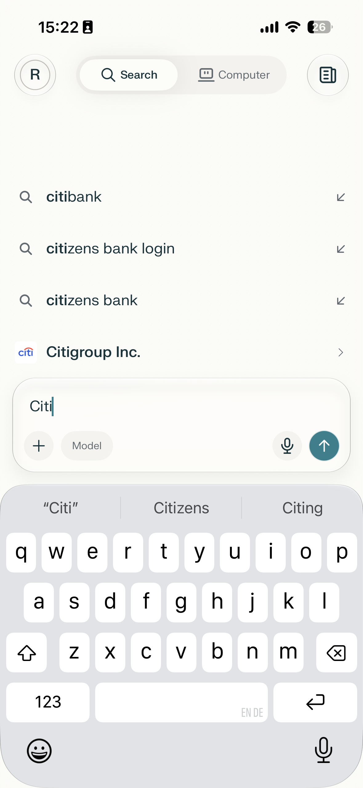 Mobile search screen with typed query, autocomplete suggestions, and on-screen keyboard open.