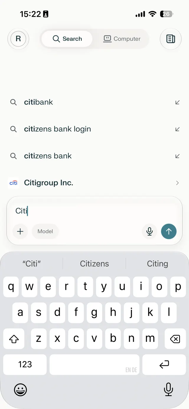 Mobile search screen with typed query, autocomplete suggestions, and on-screen keyboard open.