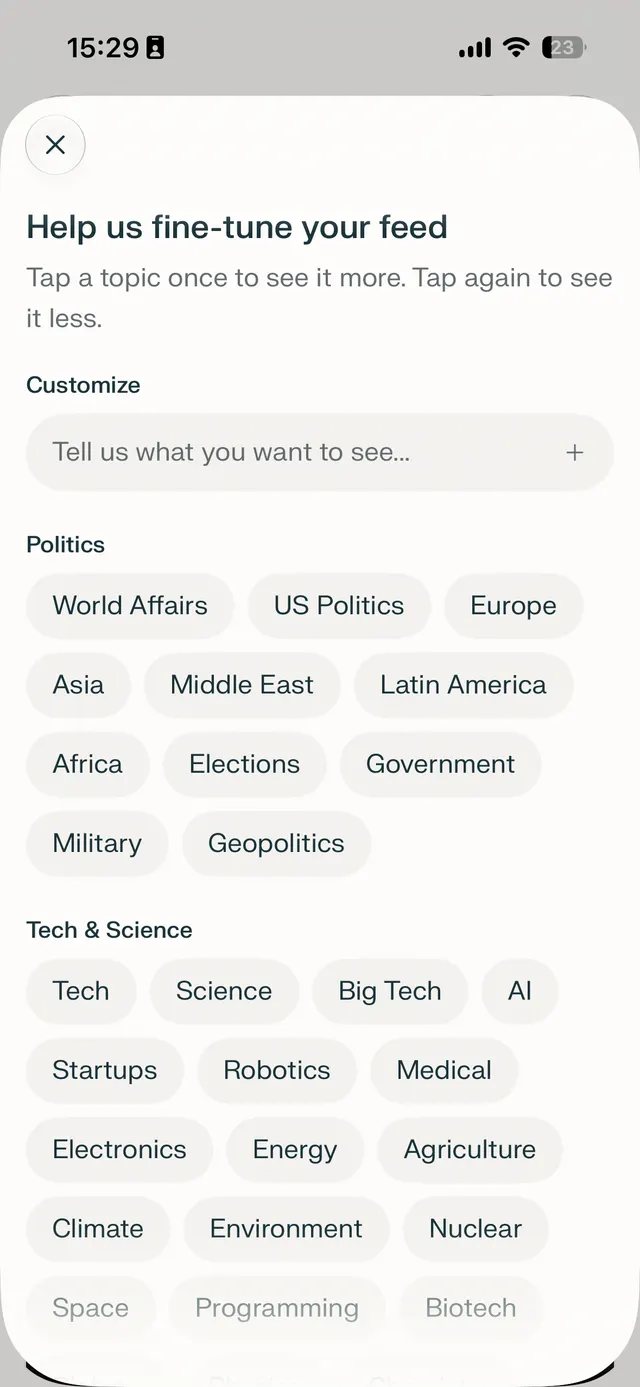 A mobile bottom sheet modal for customizing feed topics, with a close button, a search-style add field, and selectable topic chips under Politics and Tech & Science.