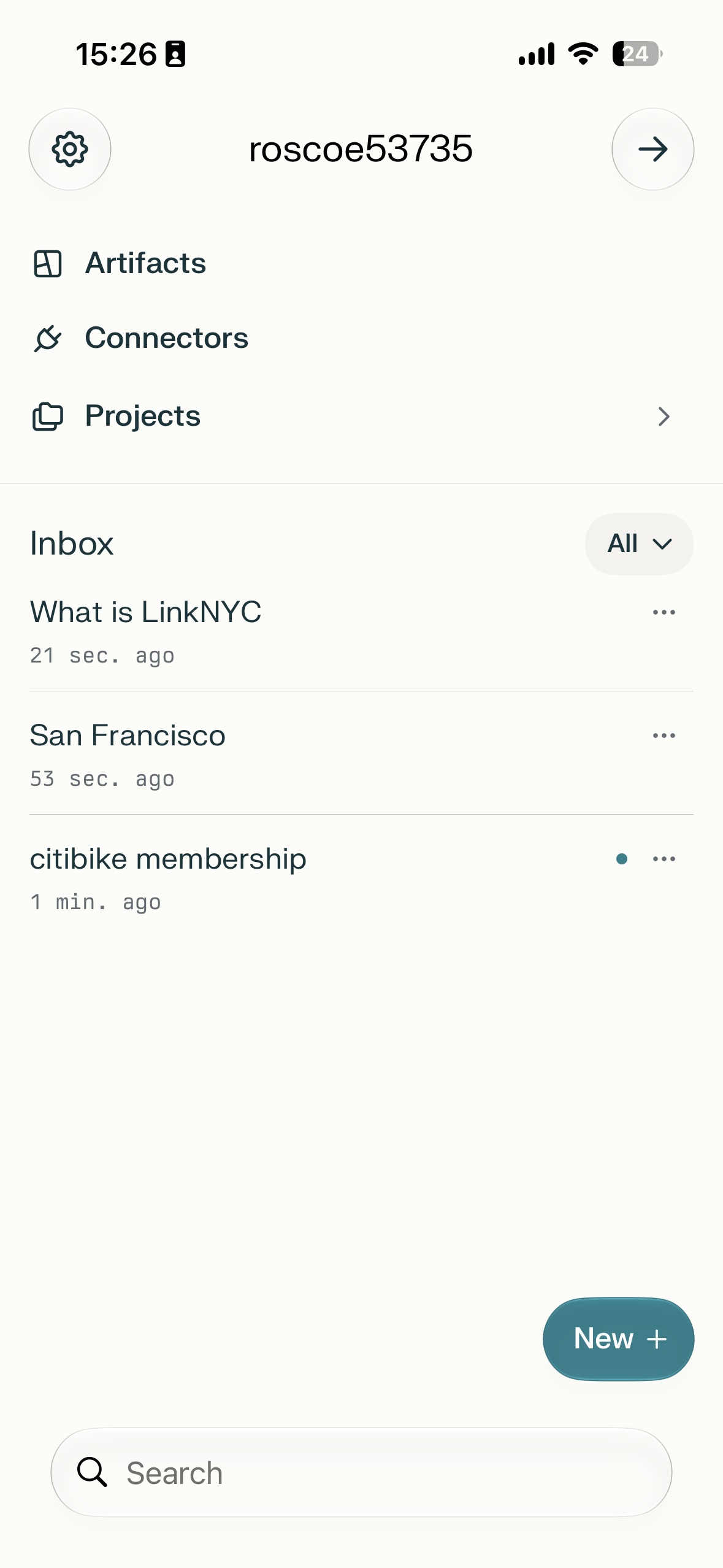 Mobile app home screen with workspace name at top, shortcuts for Artifacts, Connectors, and Projects, an Inbox list of recent items, a New button, and a search bar at the bottom.