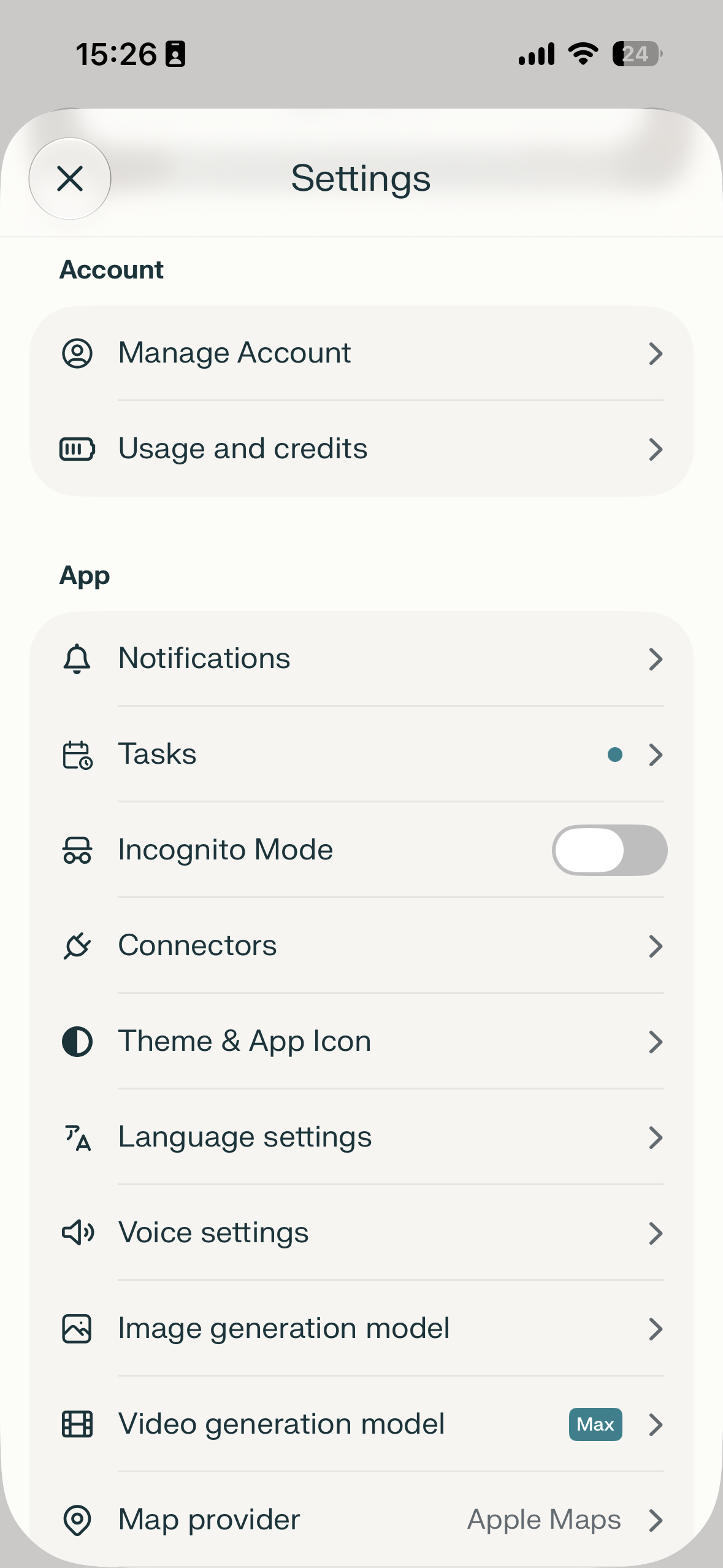 Mobile app settings page with account and app options in a grouped list, including toggles and navigation rows.