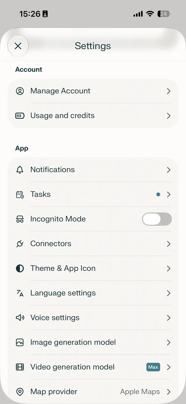 Mobile app settings page with account and app options in a grouped list, including toggles and navigation rows.