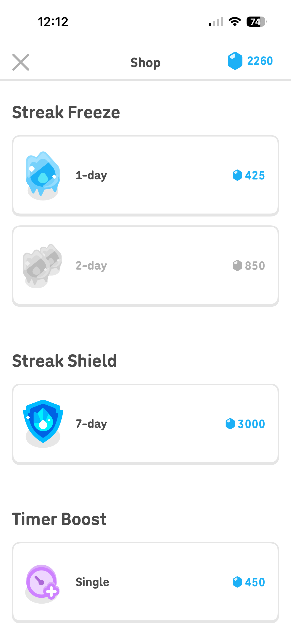 Mobile shop screen listing streak-related power-ups with item cards and gem prices.