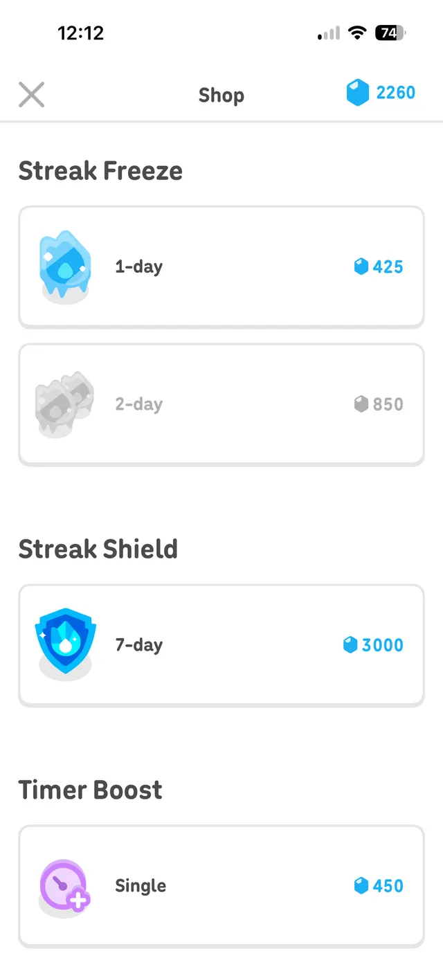 Mobile shop screen listing streak-related power-ups with item cards and gem prices.